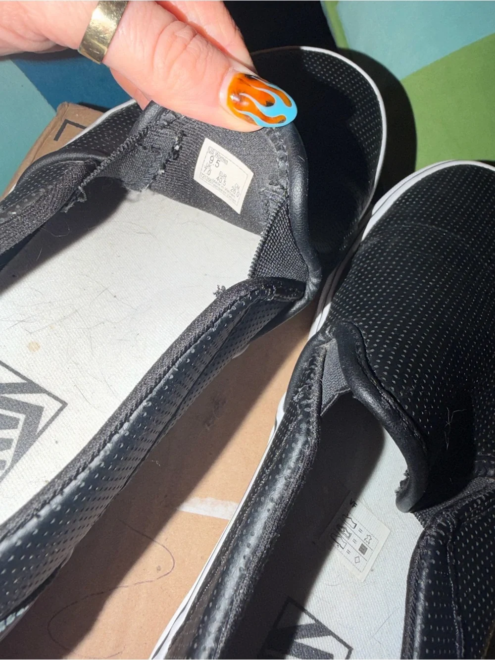Vans Black Perforated Slip-Ons
